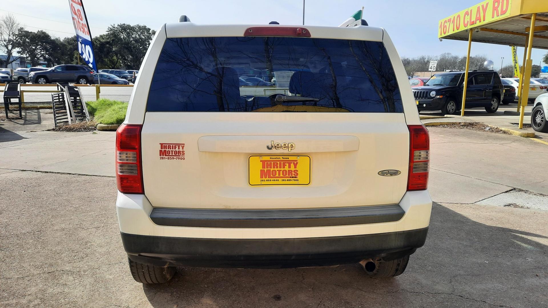 2015 Jeep Patriot (1C4NJPFA8FD) , located at 16710 Clay Rd., Houston, TX, 77084, (281) 859-7900, 29.834864, -95.656166 - Photo#1